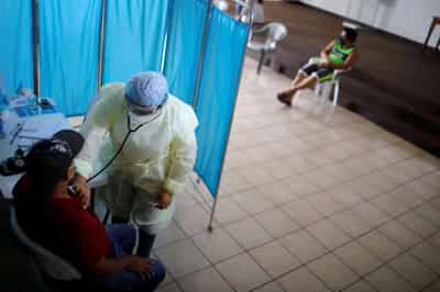 Image for Cash injection urged to help poor fight COVID-19 during vaccine wait