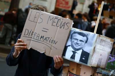 Image for Teenager has hand blown off during French school protests, official says