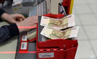 Image for Rouble falls past 61 vs dollar as conversion of depository receipts begins