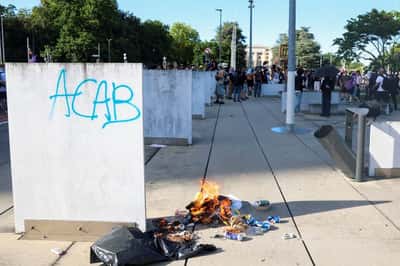 Image for Swiss police fire tear gas as anti-G7 protesters target UN site