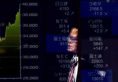 Image for Stocks hold at record highs as traders bet on rate cuts