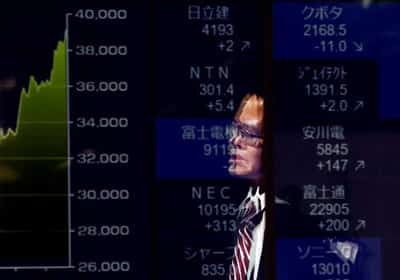 Image for Stocks hold at record highs as traders bet on rate cuts