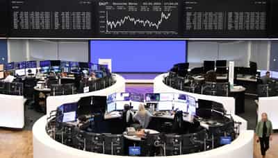 Image for Stocks and bonds take heart from Powell; commodities strong