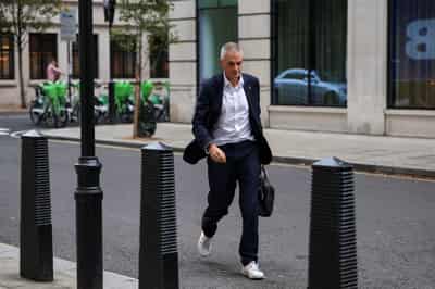 Image for BBC's outgoing boss rallies staff in face of leadership crisis and Trump legal threat