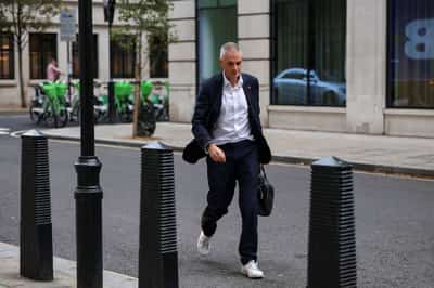 Image for BBC's outgoing boss rallies staff in face of leadership crisis and Trump legal threat