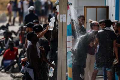 Image for Migrants say hunger and hostility drove them back from Spain's Ceuta to Morocco