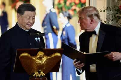 Image for Trump, Xi end summit with tea, tour of US archives - and little sign of progress