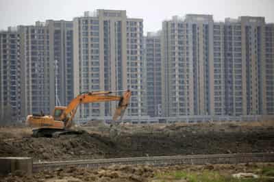 Image for Growth in China home prices to sustain momentum in 2021: Reuters poll