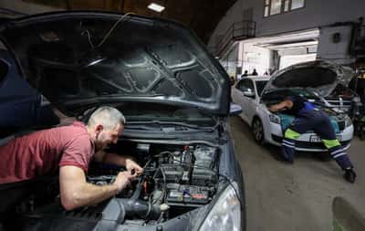 Image for Russians race to adapt cars to use LPG as gasoline runs short