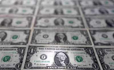 Image for Dollar retreats as investors reach for riskier currencies