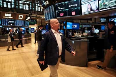 Image for Stocks suffer renewed slide on growth fears, dollar extends rally