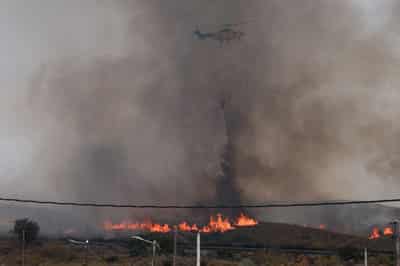 Image for Spanish wildfires claim 13th victim as British woman, 93, dies of injuries