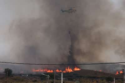 Image for Spanish wildfires claim 13th victim as British woman, 93, dies of injuries