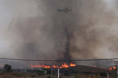 Image for Spanish wildfires claim 13th victim as British woman, 93, dies of injuries