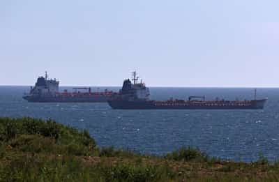 Image for Oil prices fall 2% to 2-week low as trade war concerns dampen demand outlook