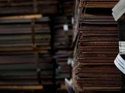 Image for Copper lurches to record high above $14,000 as speculators pile in