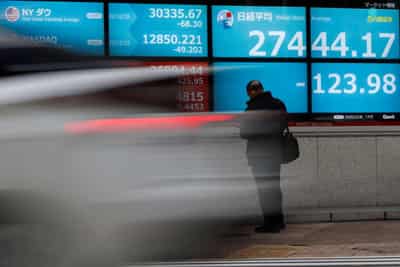 Image for Stocks gain, commodities rise on inflation worries