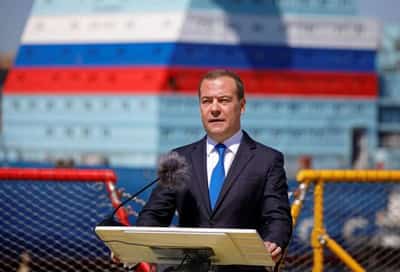 Image for Ukraine raises flag on recaptured island, loses key supporter in UK’s Johnson