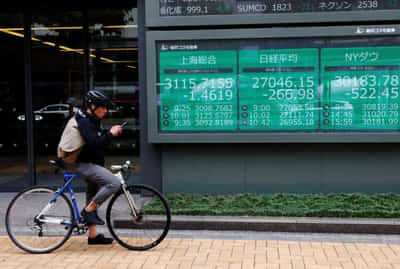 Image for Stocks hit two-year lows, sterling comes under fire