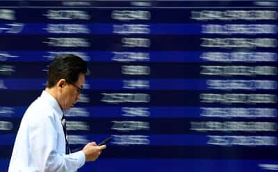 Image for Stocks rise, oil and dollar slide on Middle East peace hopes