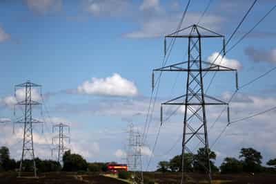 Image for Most Britons' energy bills to fall after regulator cuts cap