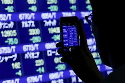 Image for Oil jumps and stock futures slip on renewed US-Iran fighting