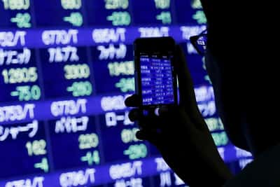Image for Oil jumps and stock futures slip on renewed US-Iran fighting