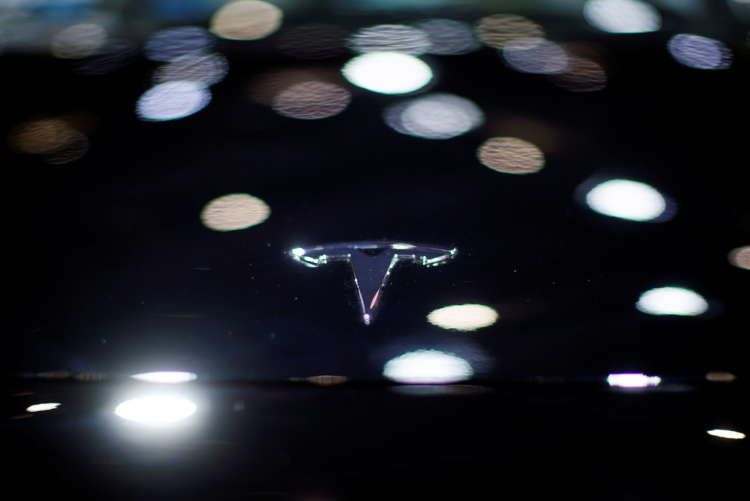 Image for Tesla apologizes after customer protested at autoshow, to share car data with Chinese regulator