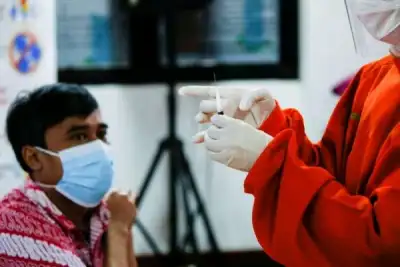 Image for Chickens, cows, apartments offered up in Asia&#8217;s vaccination lucky draws