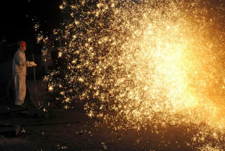 Image for China&#8217;s factory output slows as bottlenecks crimp production