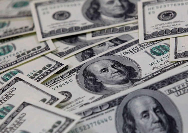 Image for Dollar retreats as riskier currencies rebound