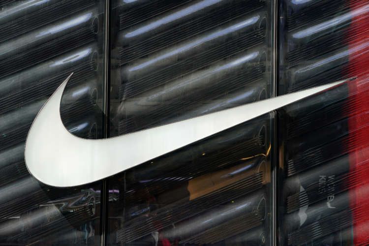 Image for Nike sales crimped by pandemic, shipping issues; forecast disappoints