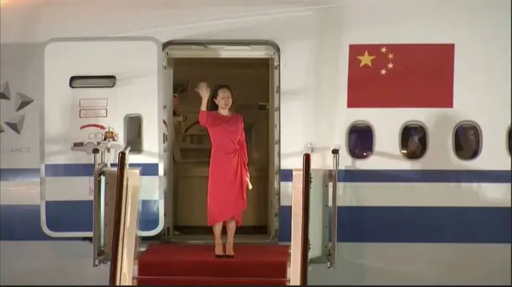 Image for China welcomes Huawei executive home, Trudeau hugs Canadians freed by Beijing