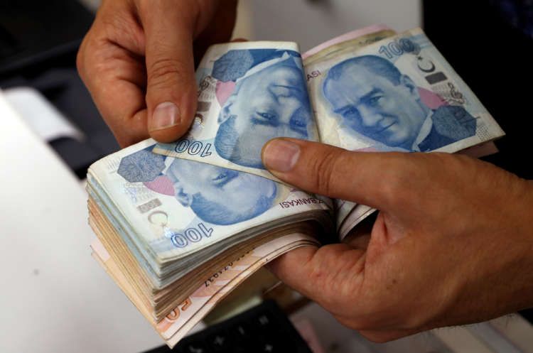 Image for Analysis: Foreigners suspend disbelief, edge back into Turkish markets
