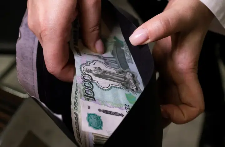 Image for Russian rouble at 110 to US dollar, down by one quarter since early August