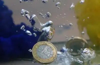 Image for Sterling falls ahead of UK budget, while volatility gauge jumps