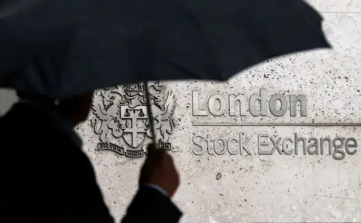 Image for UK’s FTSE 100 slips on utilities losses; indexes set for weekly gains