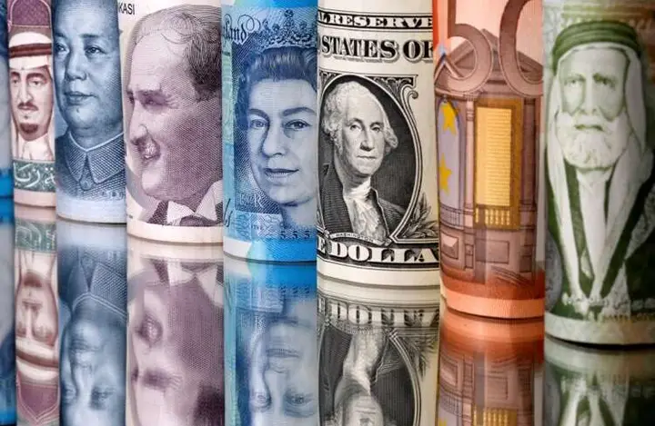 Image for Dollar tumbles as U.S. nonfarm payrolls show mixed picture