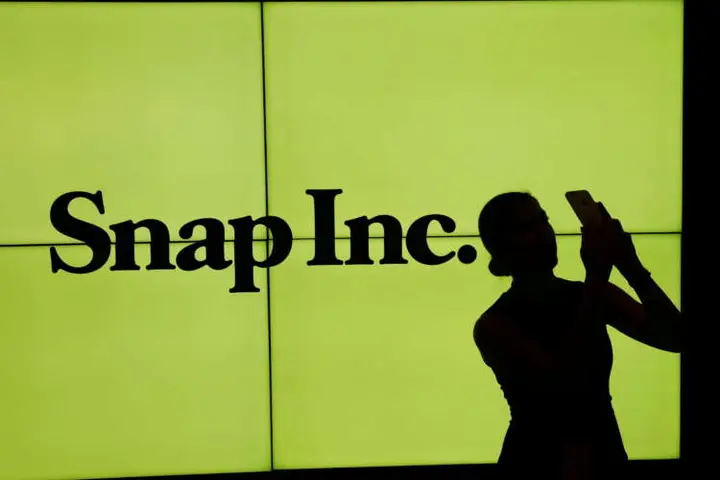 Image for Snap adds money earning features, plans new augmented reality glasses
