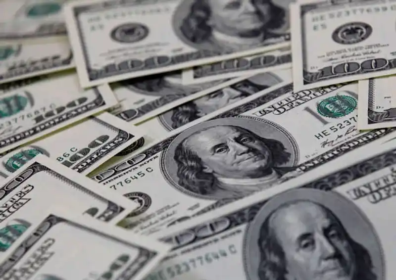 Image for Dollar sinks for 3rd straight session as risk sentiment rises