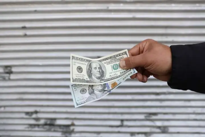 Image for Dollar rises towards 20-year high, euro dips after weak data