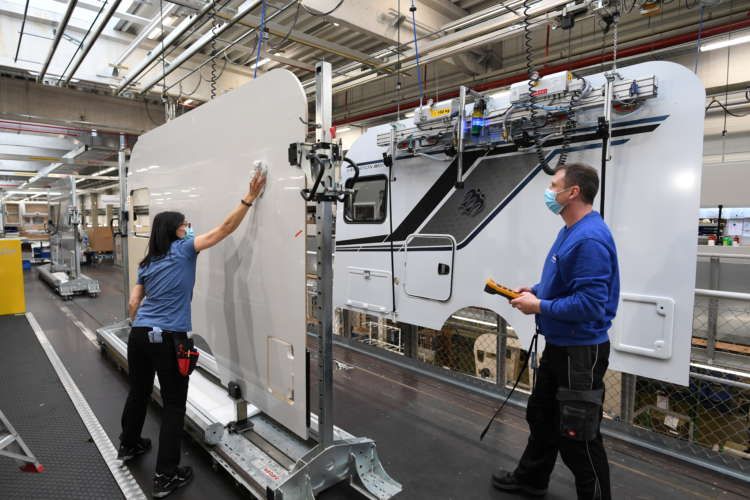 Image for March lockdown easing pushes German factory activity to record high: PMI