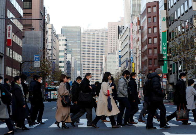 Japan downgrades fourth-quarter GDP as companies scale back spending